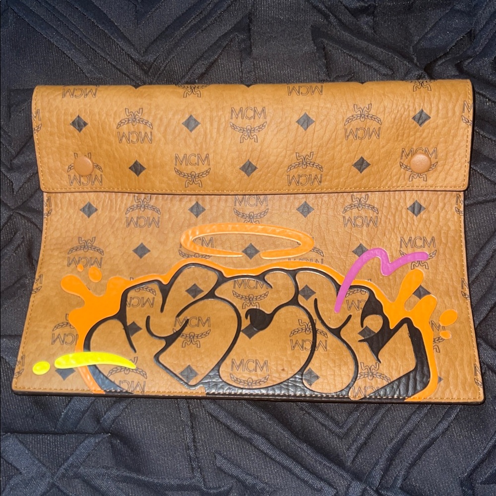 MCM Brown Clutch with Vibrant Graphic Accents